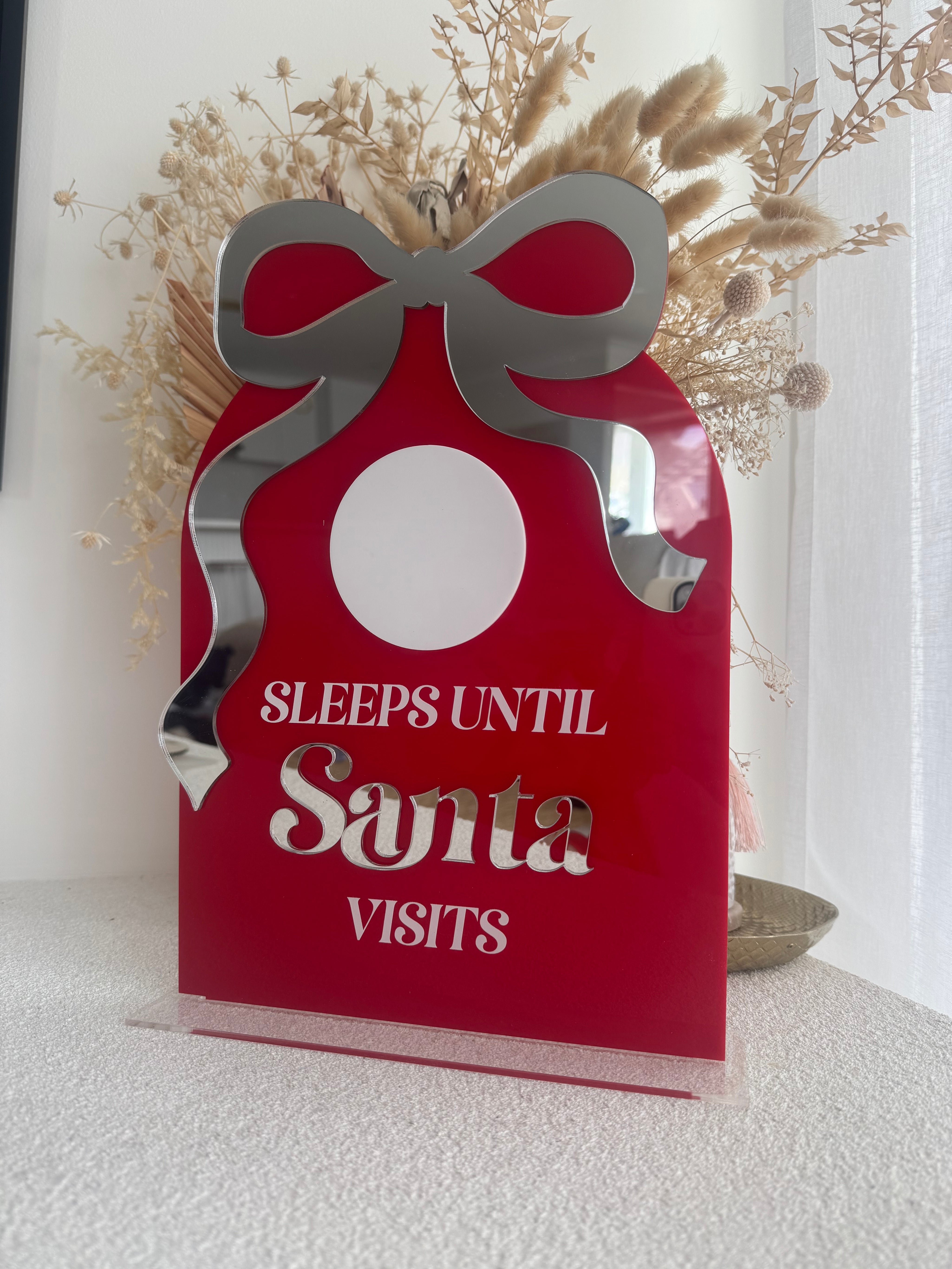 Luxe bow santa count down - Gifts that give back
